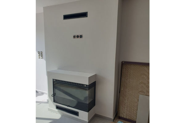 fireplace created by the placement of energy save kasette sener corner superkamin photo