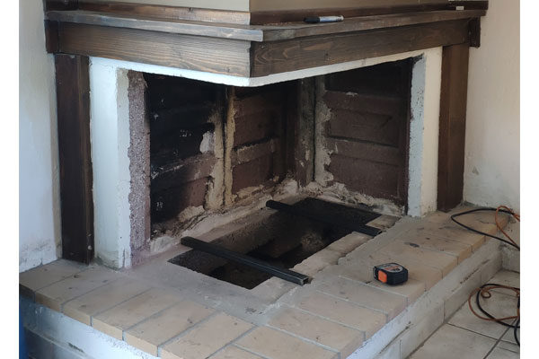 fireplace before the installation of an energy save cassette superkamin insert sener corner