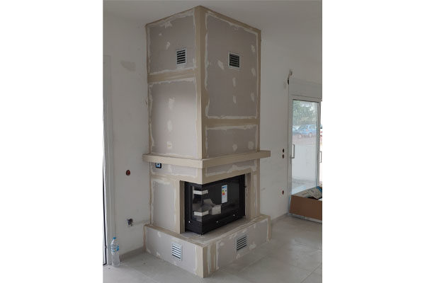 installation of T  corner energy save fireplace from start misailidis
