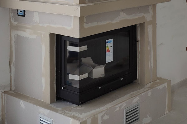installation of T  corner energy save fireplace from start misailidis close up