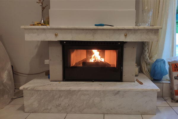 fireplace after the installation of a energy save cassette superkamin insert sener