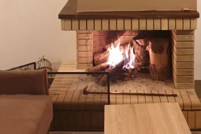 open fireplace classic two sided with firebrick facade