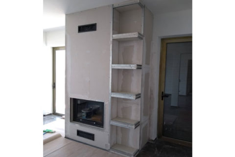 energy save fireplace plano ef  mddle in place with shelves on the side from camino design