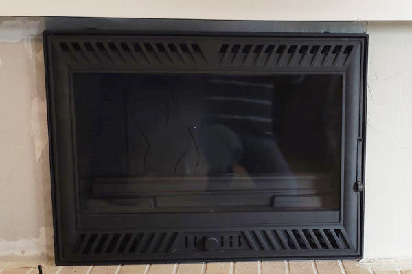 fireplace after the installation of an energy save cassette invicta insert  s