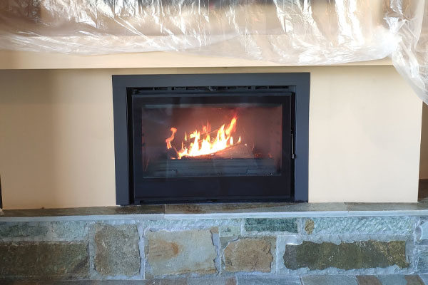 grand angle from invicta in an open fireplace